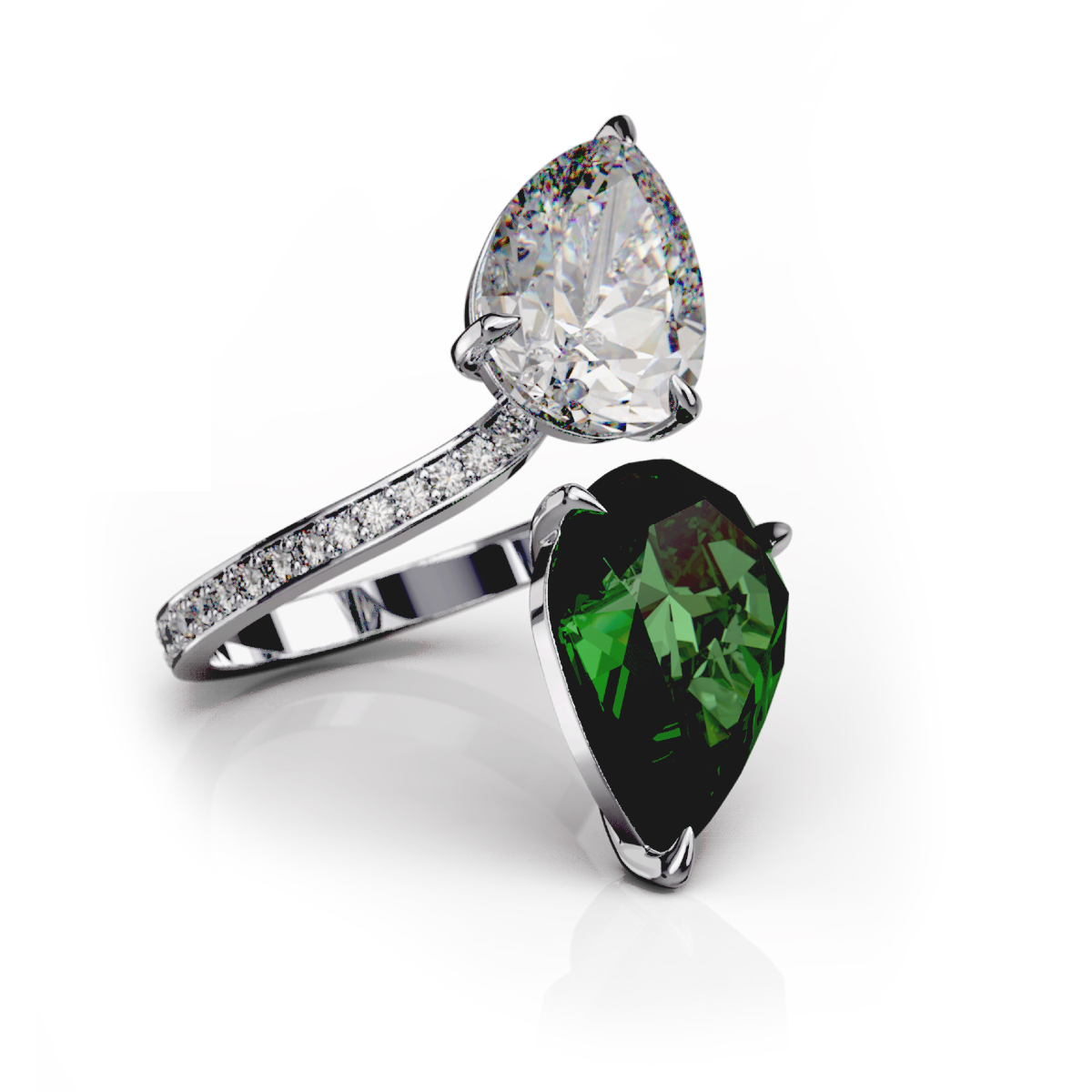 Toi-et-moi ring with a pear-cut tsavorite and a pear-cut white diamond on a pavé-set white-gold band
